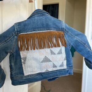 Denim jackets revamped with fringe 12m